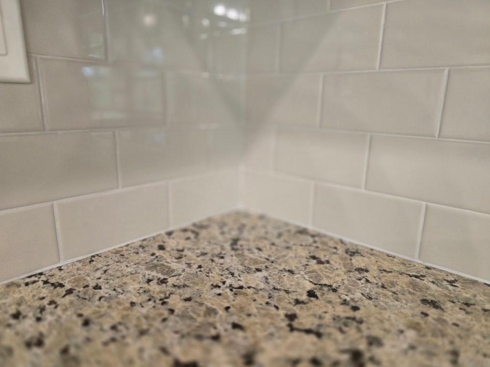 6194 Ripple Way, Unit 86 Atlanta, GA 30349 - Photo 7 of 27 a bathroom with a bathtub