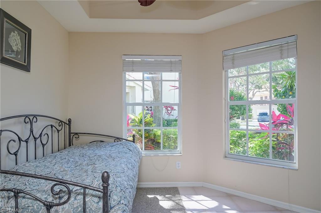 1072 Egrets Walk Circle, Unit 104 Naples, FL 34108 - Photo 21 of 37 a view of a livingroom with furniture