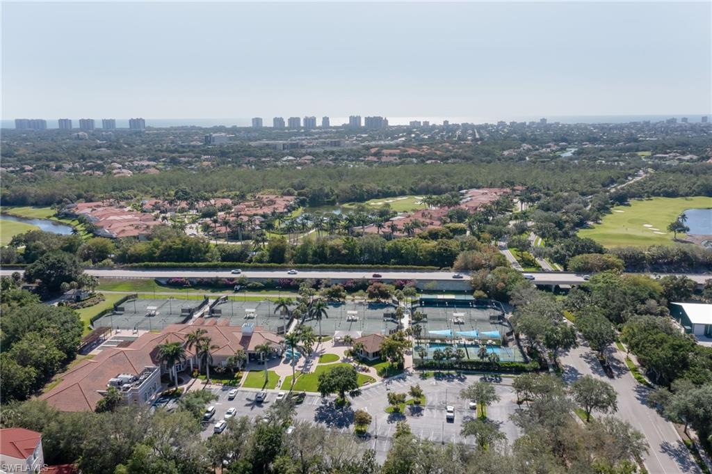1072 Egrets Walk Circle, Unit 104 Naples, FL 34108 - Photo 35 of 37 an aerial view of a city