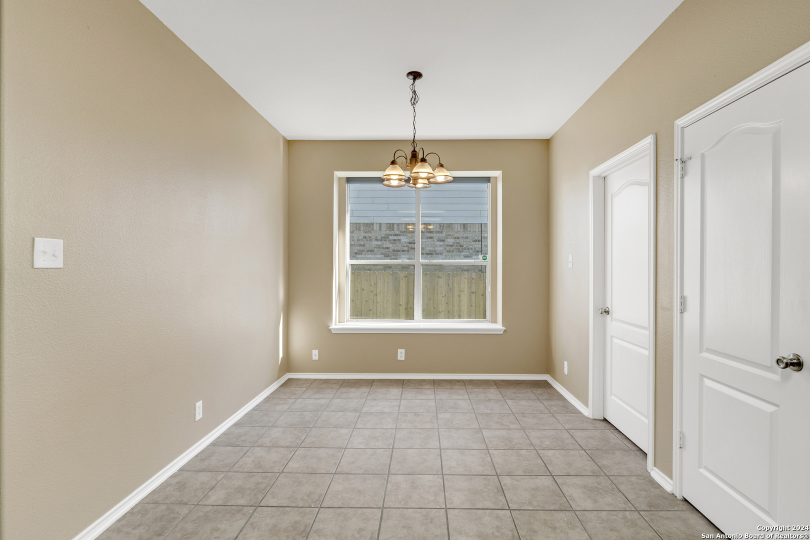 225 Crimson Tree Cibolo, TX 78108 - Photo 15 of 34 a view of an empty room with a window