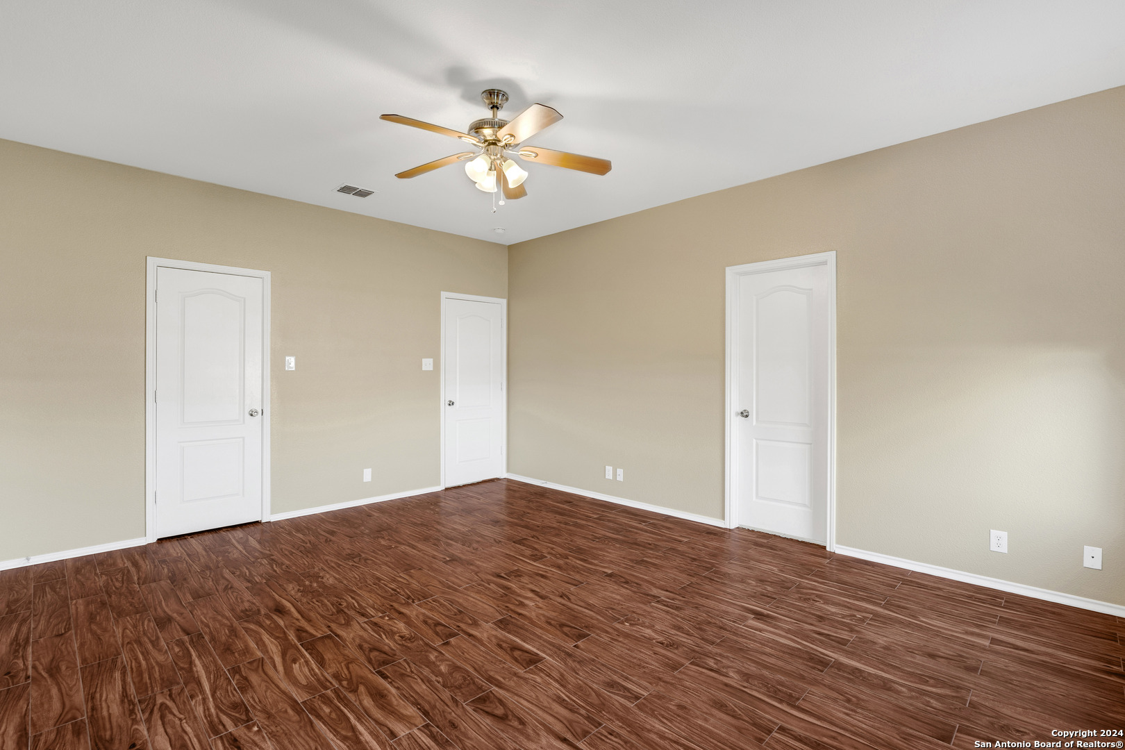 225 Crimson Tree Cibolo, TX 78108 - Photo 21 of 34 a view of empty room with wooden floor