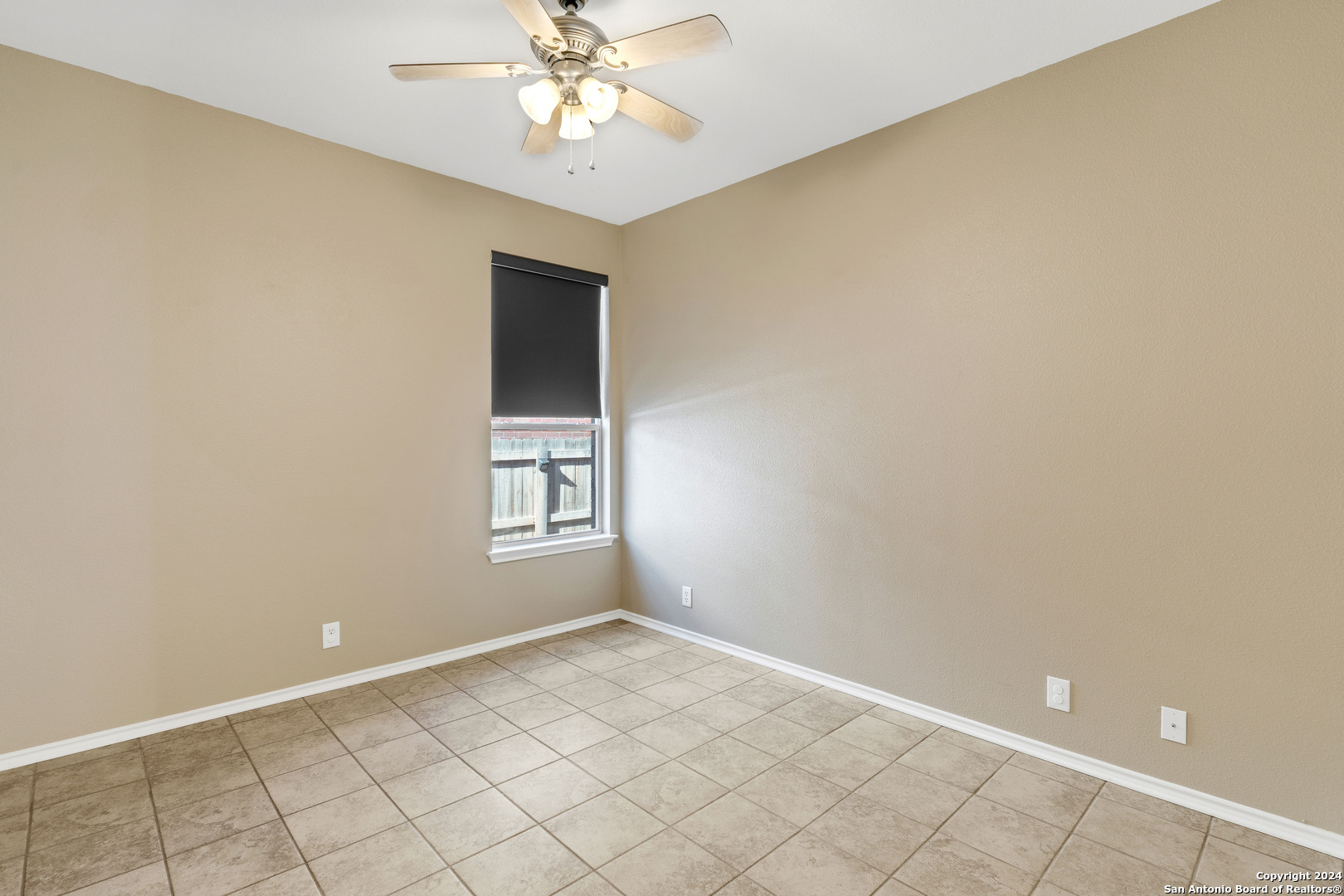 225 Crimson Tree Cibolo, TX 78108 - Photo 30 of 34 an empty room with windows and fan