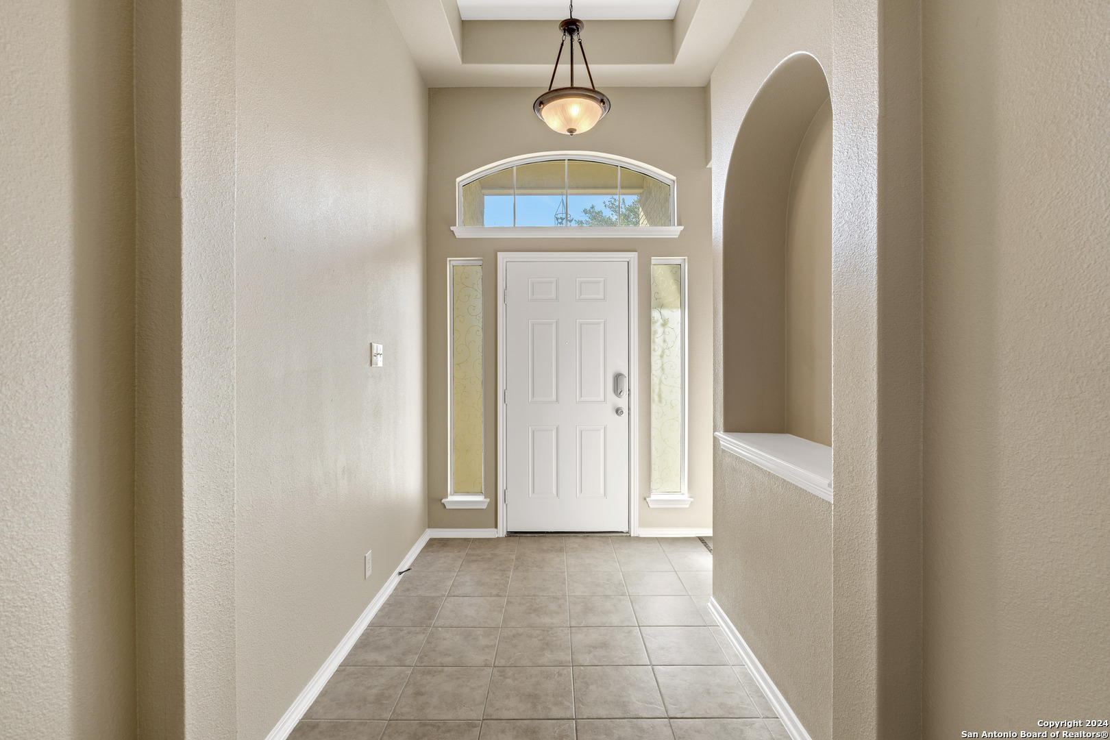 225 Crimson Tree Cibolo, TX 78108 - Photo 3 of 34 a view of a hallway with windows