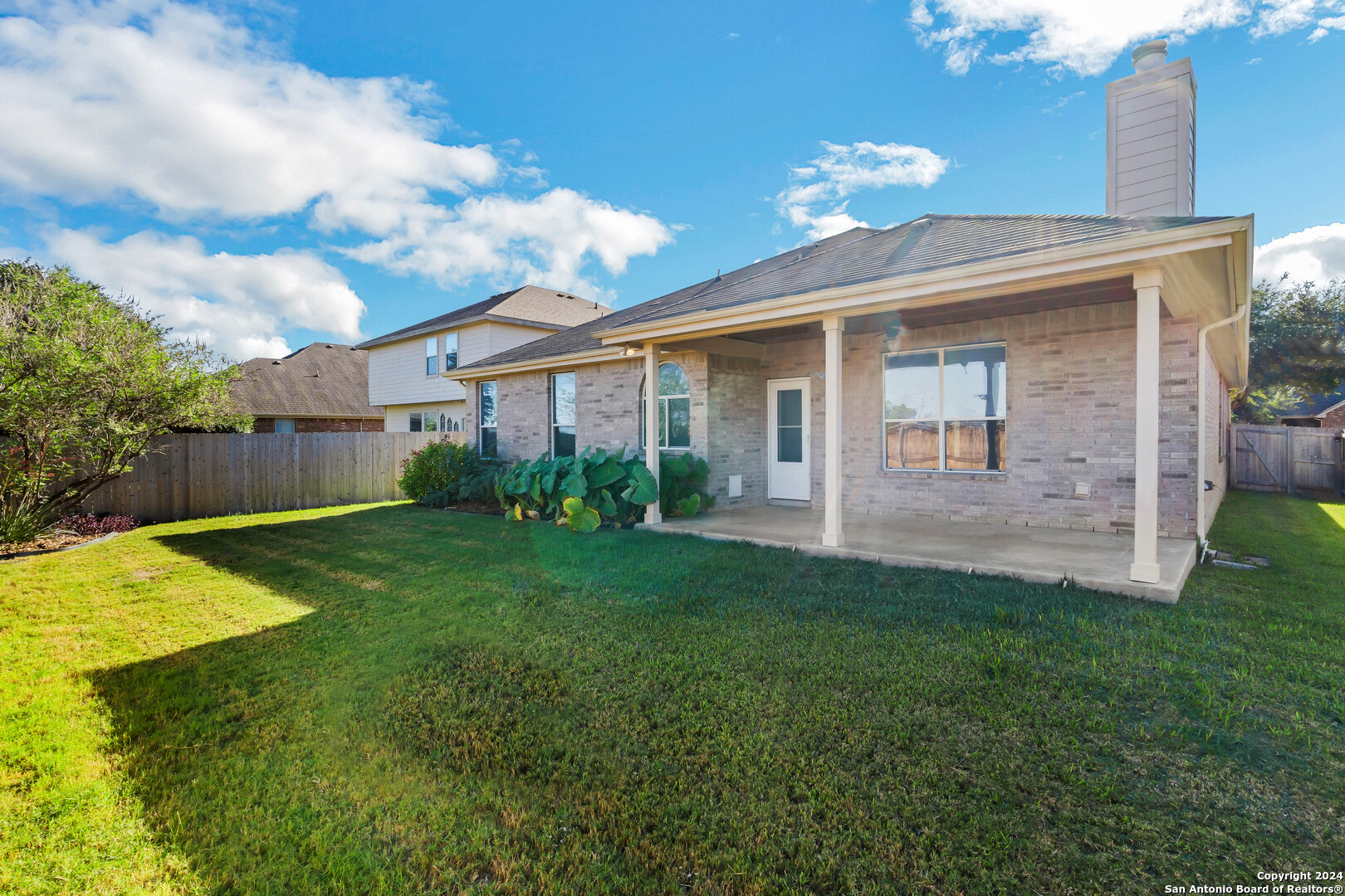 225 Crimson Tree Cibolo, TX 78108 - Photo 33 of 34 a front view of house with yard and green space