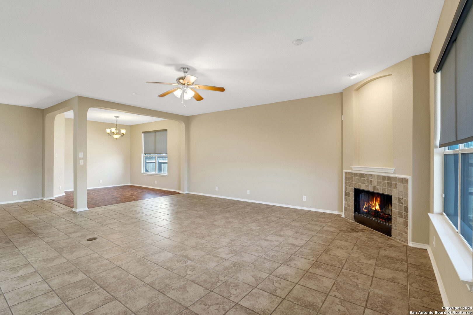 225 Crimson Tree Cibolo, TX 78108 - Photo 7 of 34 a view of an empty room with a fireplace
