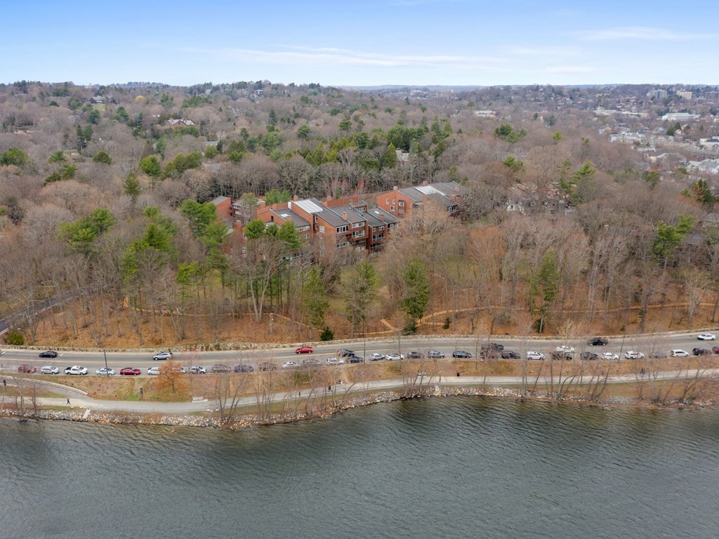 241 Perkins Street, Unit A602 Boston, MA 02130 - Photo 19 of 24 an aerial view of a house with a yard