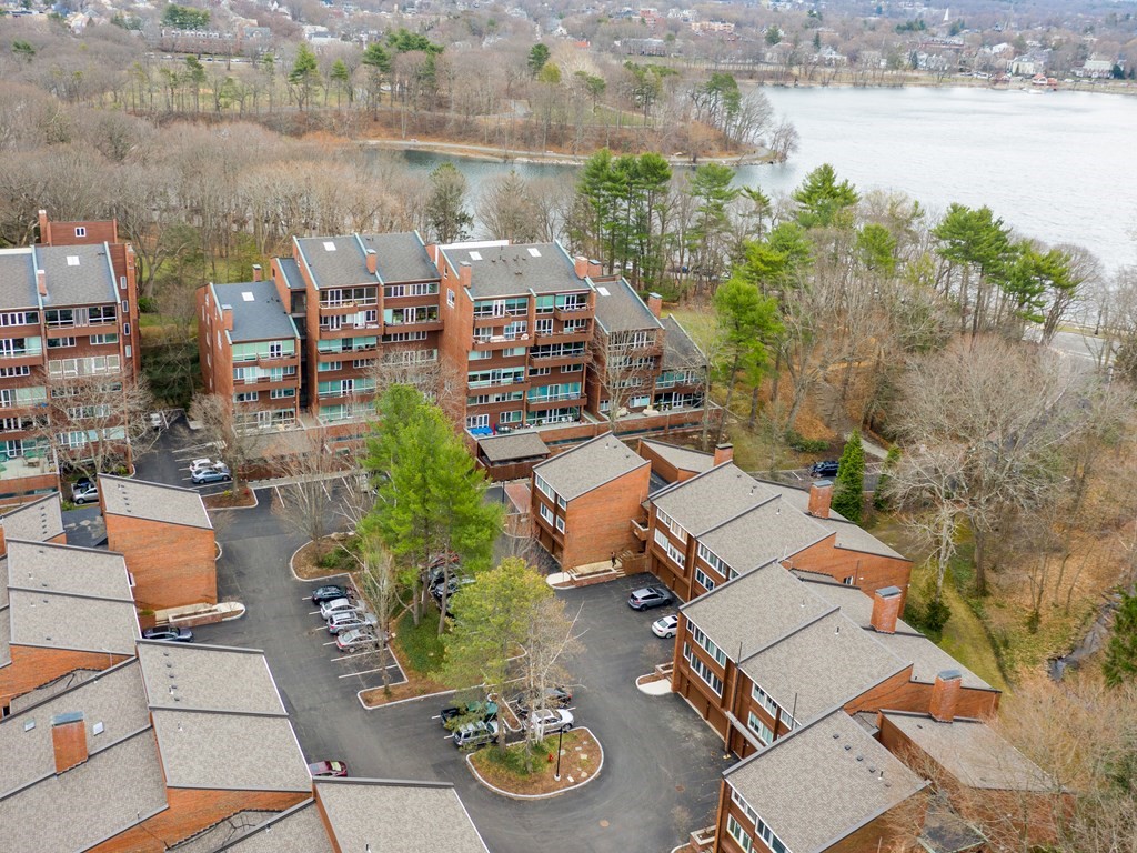 241 Perkins Street, Unit A602 Boston, MA 02130 - Photo 22 of 24 an aerial view of a house with garden space and lake view