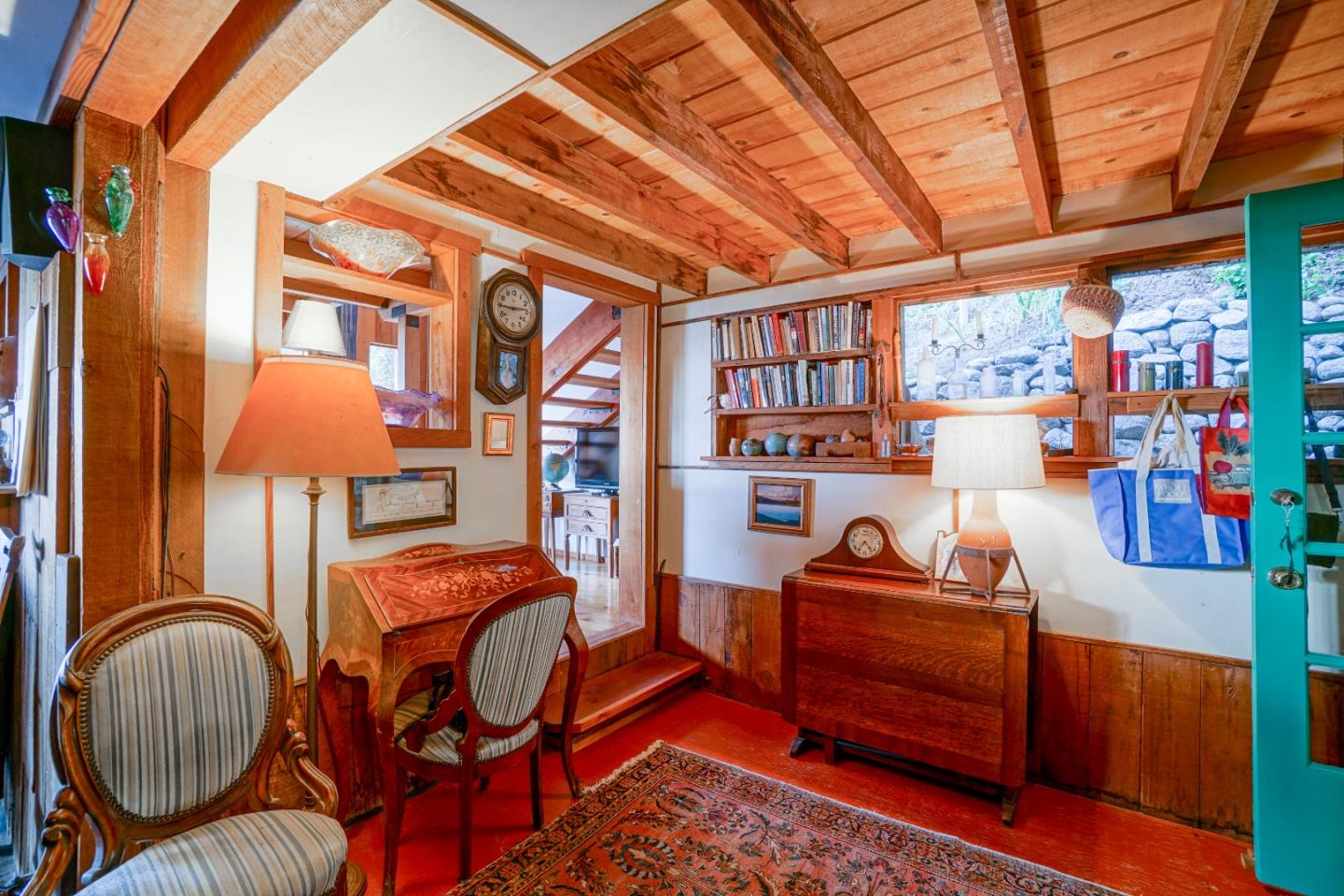 37763 Palo Colorado Road Carmel, CA 93923 - Photo 11 of 32 a dining room with furniture and a chandelier