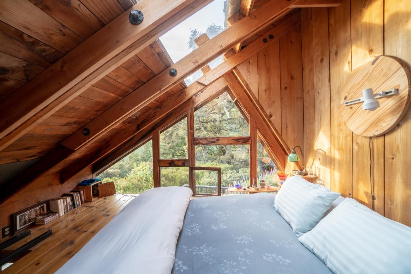 37763 Palo Colorado Road Carmel, CA 93923 - Photo 14 of 32 a view of a bedroom with wooden floor and stairs