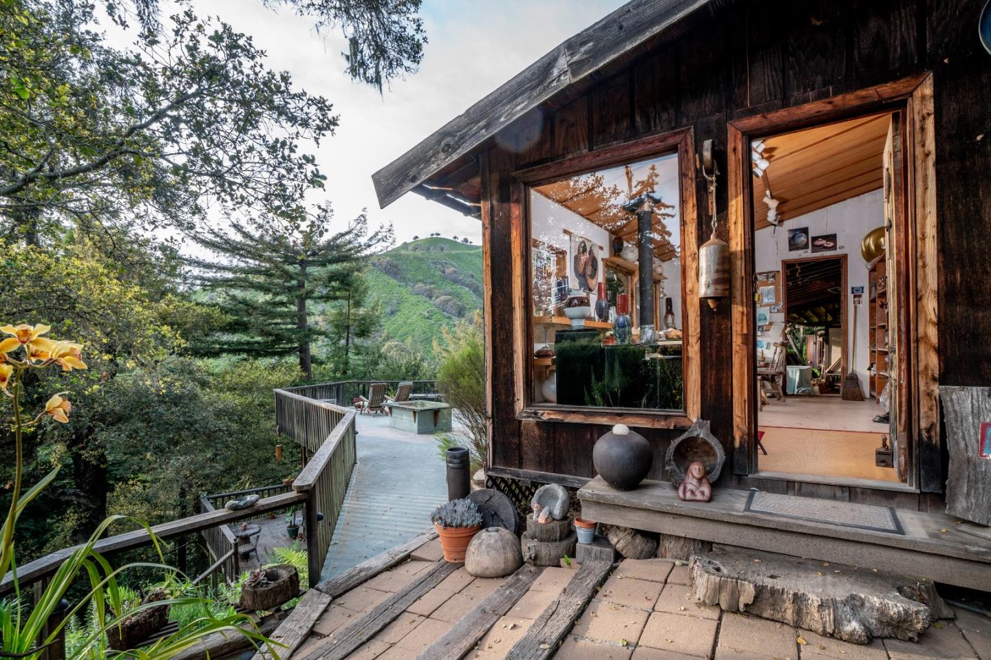 37763 Palo Colorado Road Carmel, CA 93923 - Photo 18 of 32 a view of balcony with chairs and wooden floor