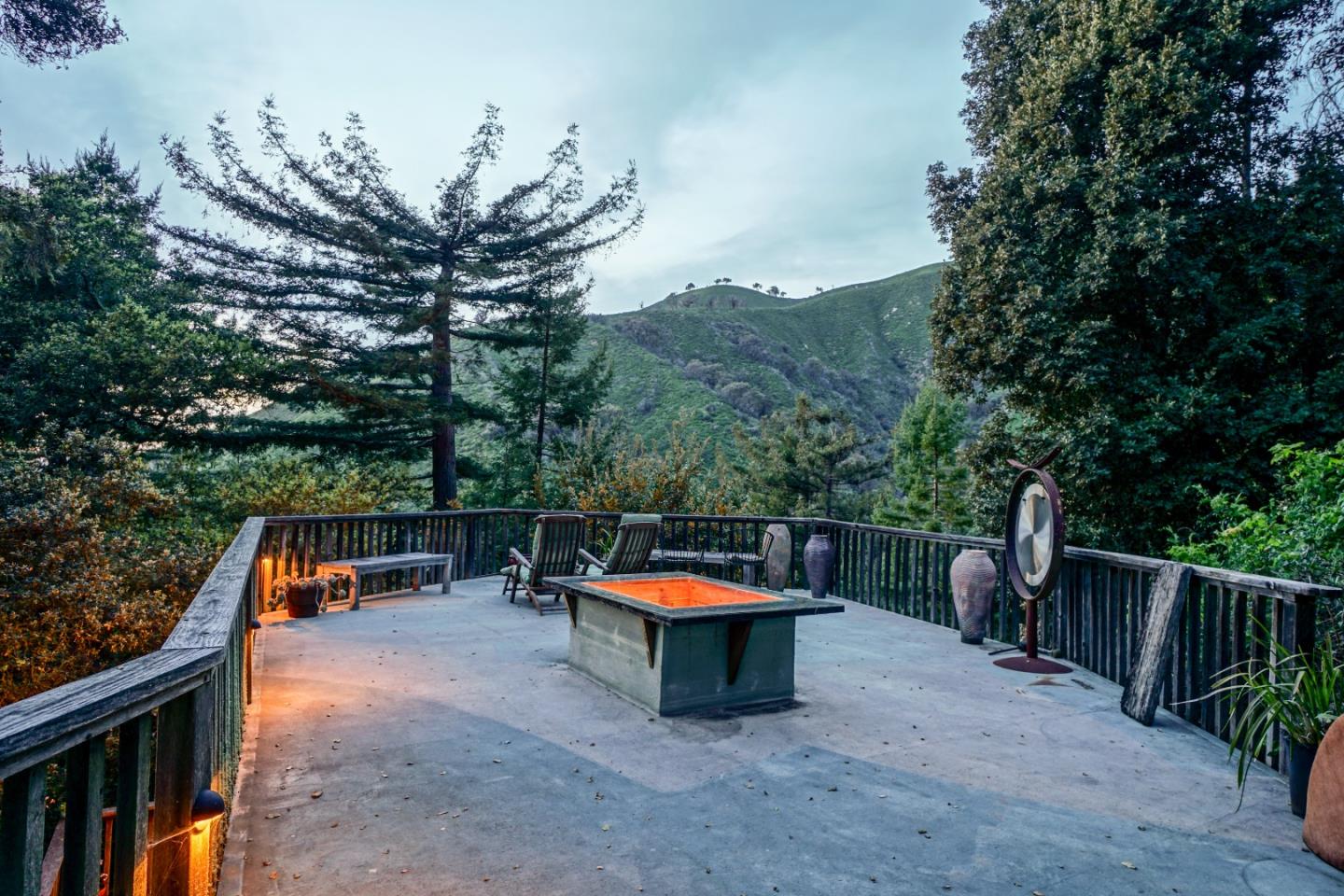 37763 Palo Colorado Road Carmel, CA 93923 - Photo 20 of 32 a backyard of a house with table and chairs
