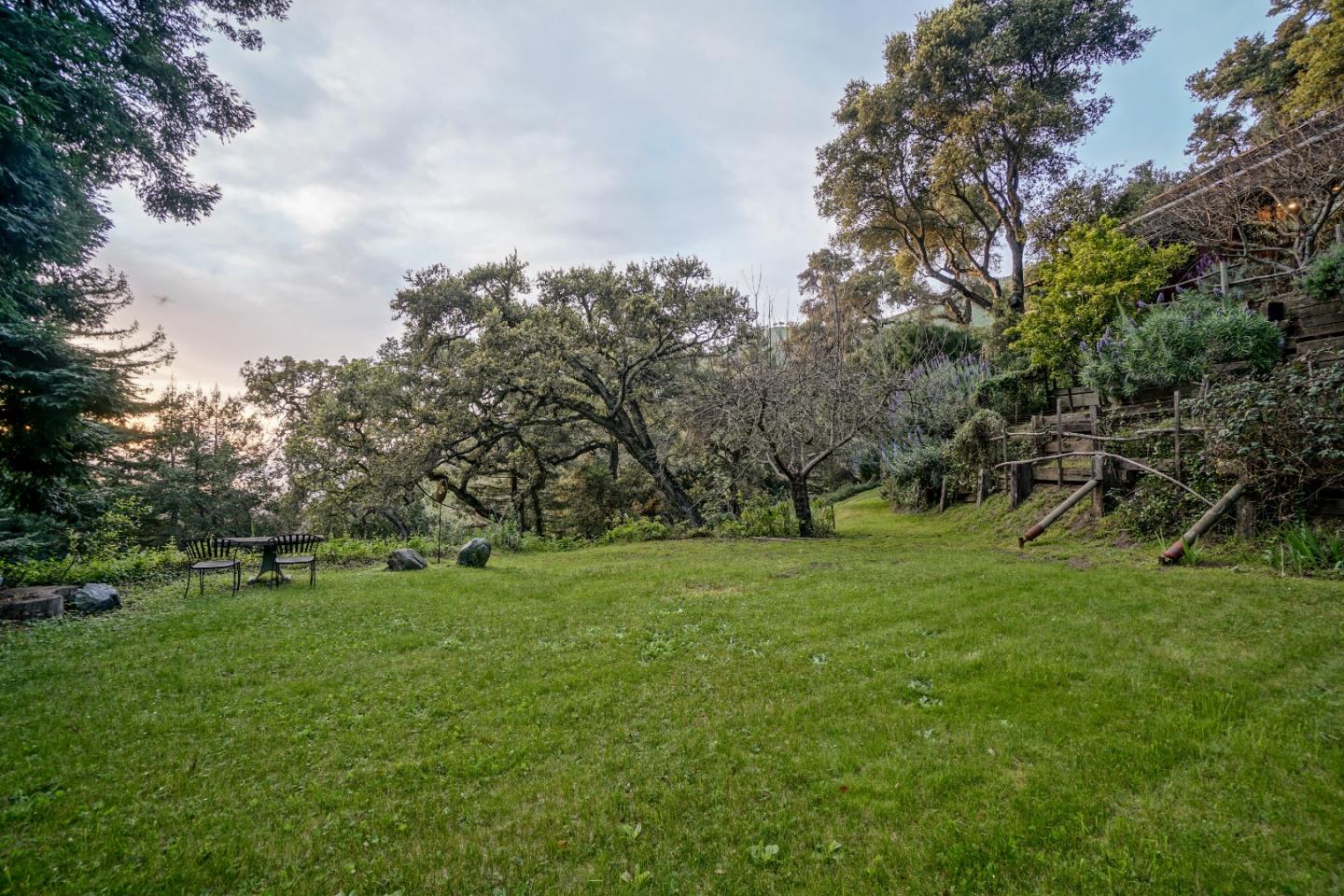 37763 Palo Colorado Road Carmel, CA 93923 - Photo 26 of 32 a big yard with lots of green space and trampoline