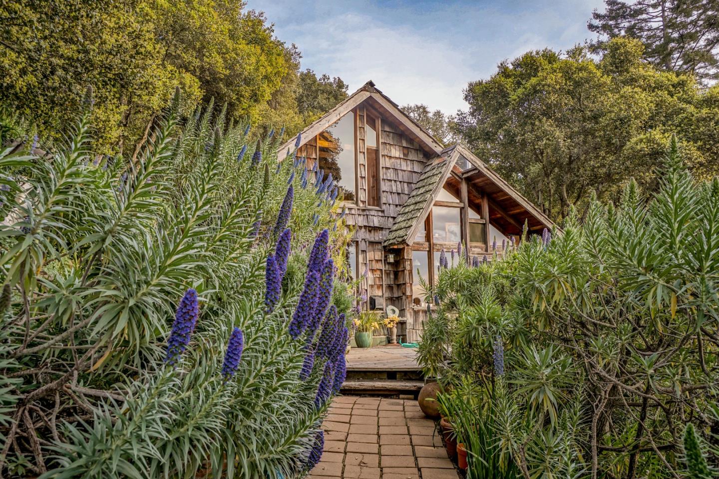37763 Palo Colorado Road Carmel, CA 93923 - Photo 4 of 32 a front view of a house with street