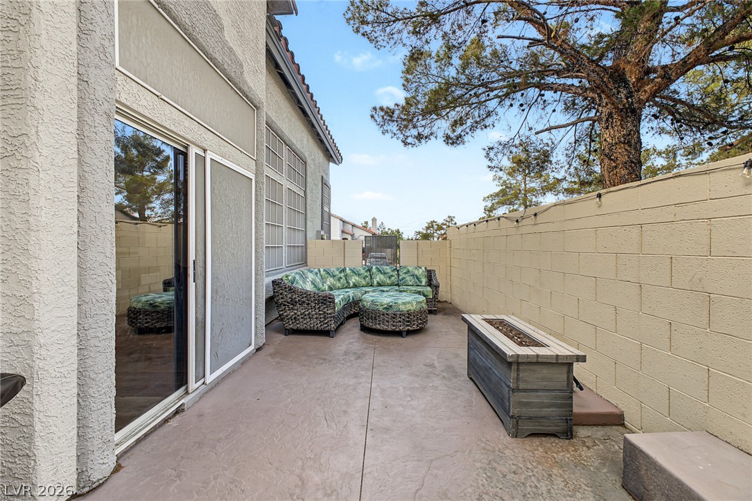 2376 Ramsgate Drive Henderson, NV 89074 - Photo 24 of 25 An enclosed patio with textured concrete flooring provides a private outdoor retreat.