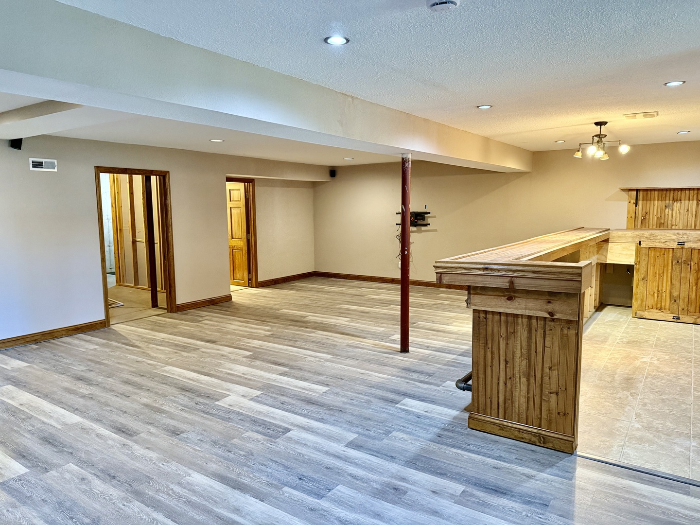 317 Plymouth Court Sycamore, IL 60178 - Photo 13 of 18 a view of a livingroom with wooden floor and staircase