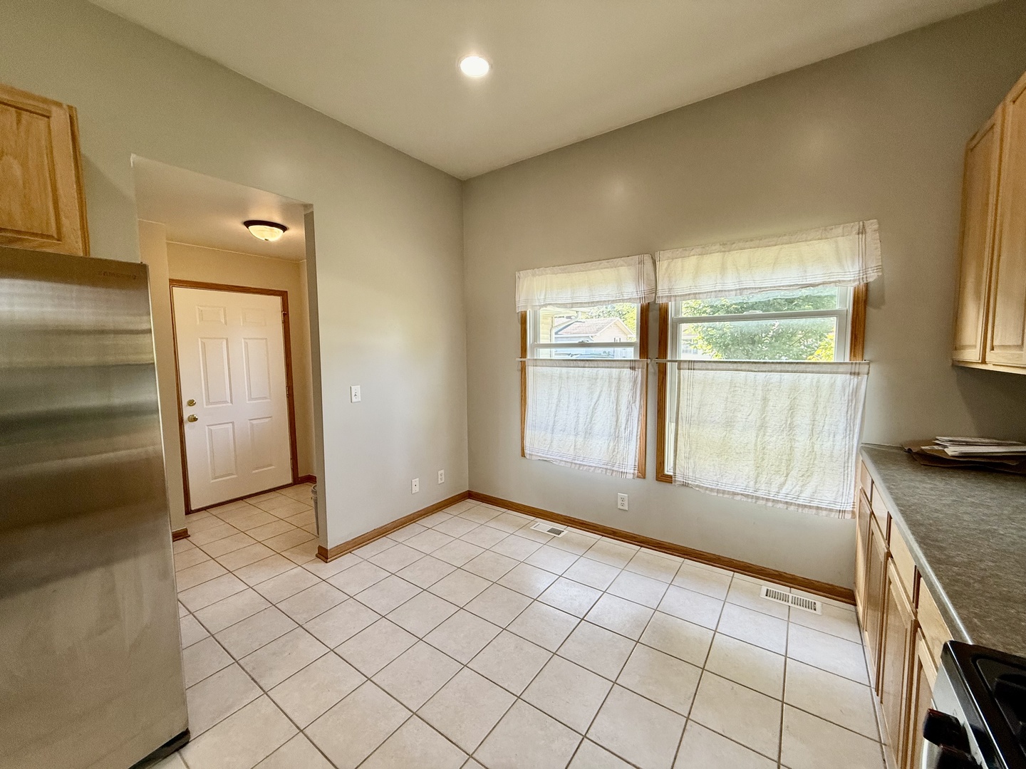 317 Plymouth Court Sycamore, IL 60178 - Photo 3 of 18 a view of an empty room and window