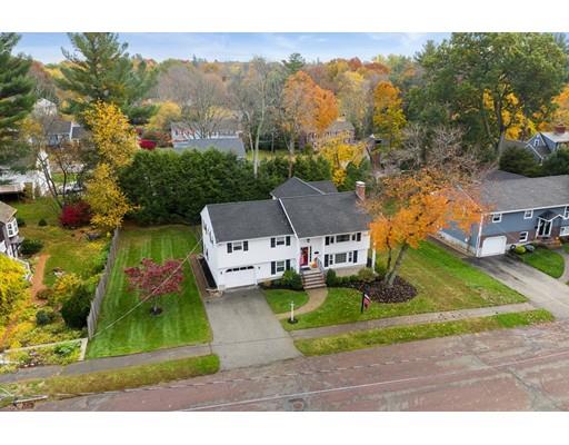 10 Hemlock Road Reading, MA 01867 - Photo 2 of 42 an aerial view of residential houses with outdoor space and trees