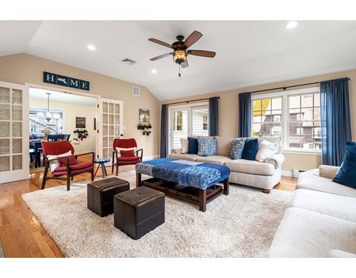 10 Hemlock Road Reading, MA 01867 - Photo 21 of 42 a living room with furniture and a large window