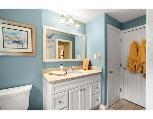 10 Hemlock Road Reading, MA 01867 - Photo 25 of 42 a bathroom with a sink and a mirror