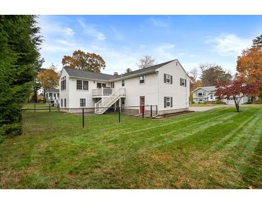 10 Hemlock Road Reading, MA 01867 - Photo 40 of 42 a view of a house with a yard