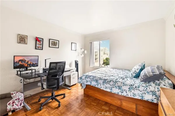 a bedroom with a bed and furniture