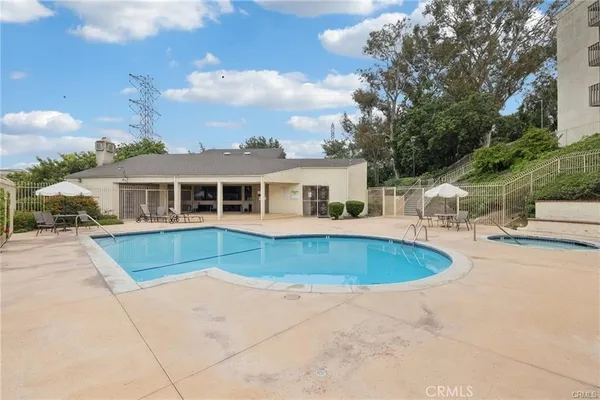 a front view of a house with swimming pool