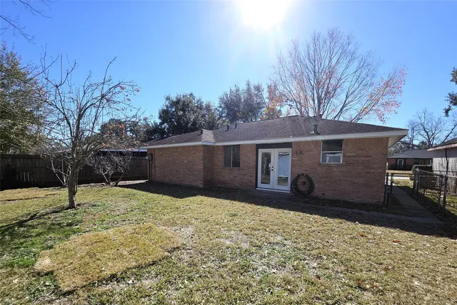 a house view with a backyard space