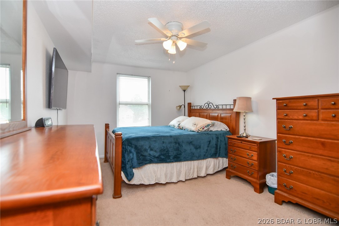 1118 Passover Road, Unit E216 Osage Beach, MO 65065 - Photo 13 of 31 Large bedroom
