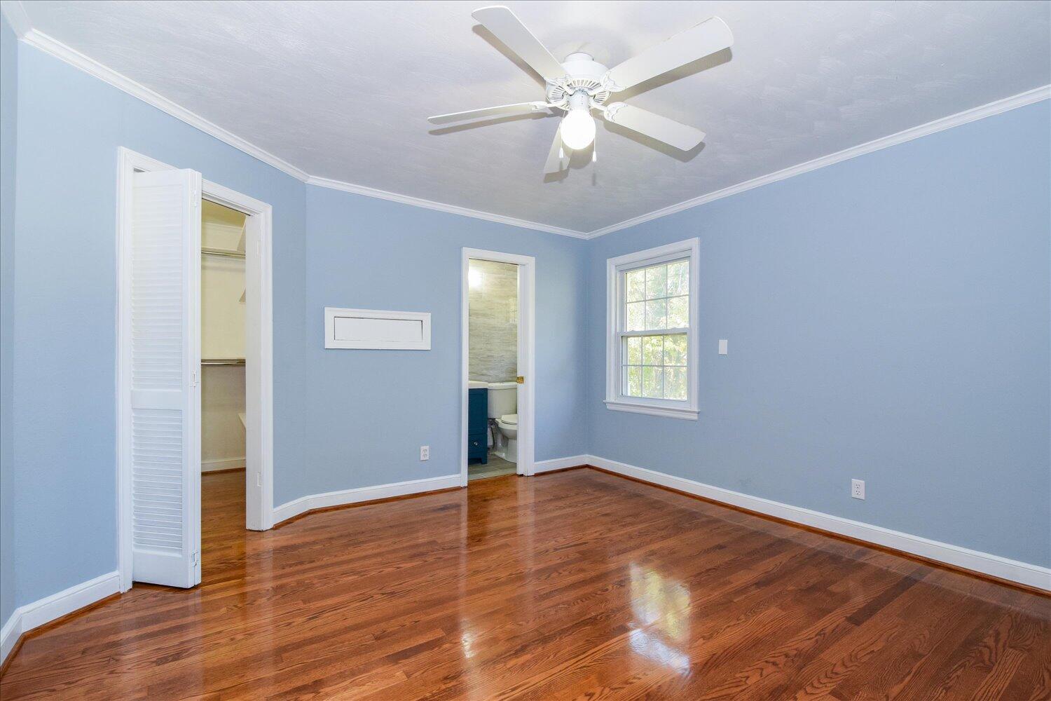 3703 Cove Road Roanoke, VA 24017 - Photo 7 of 27 wooden floor in an empty room with a window