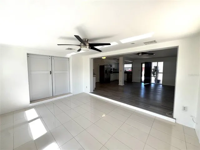 a view of an entryway with a chandelier