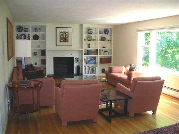 115 Moore Road Sudbury, MA 01776 - Photo 3 of 12 a living room with furniture and a fireplace