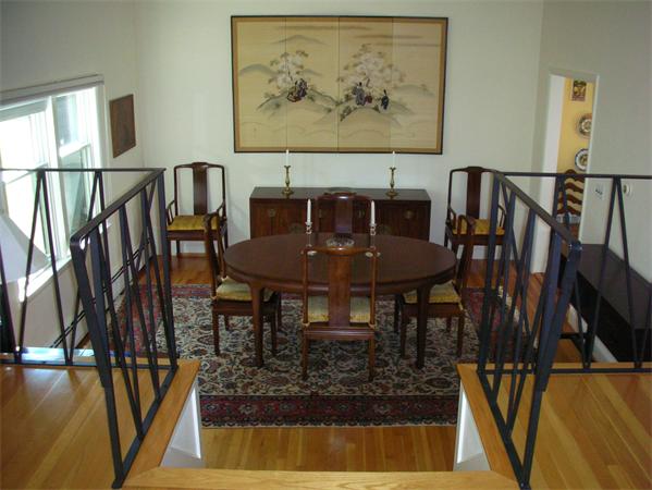 115 Moore Road Sudbury, MA 01776 - Photo 4 of 12 a view of a dining room with furniture and wooden floor