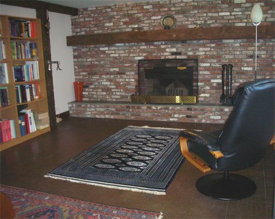 115 Moore Road Sudbury, MA 01776 - Photo 10 of 12 a living room with fireplace