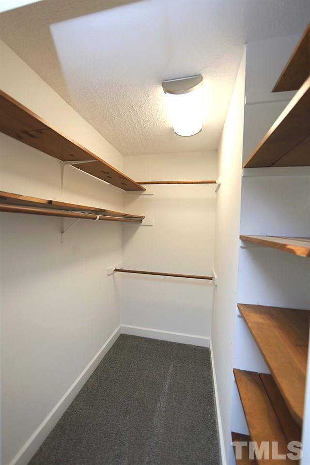 3312 High Gate Road Raleigh, NC 27603 - Photo 14 of 22 a view of an empty walk in closet