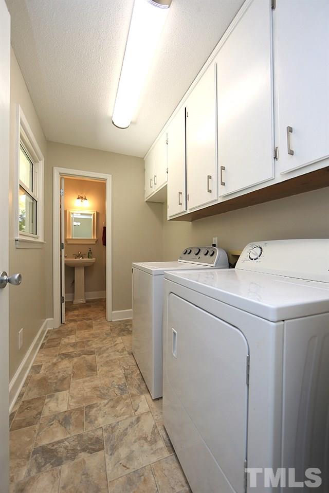 3312 High Gate Road Raleigh, NC 27603 - Photo 18 of 22 a utility room with dryer and washer