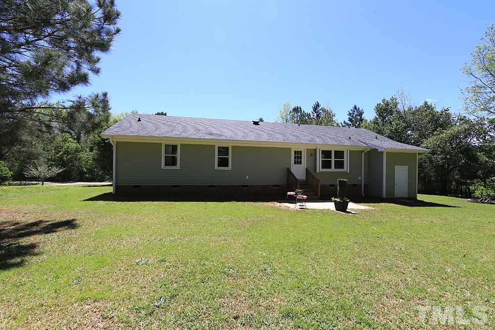 3312 High Gate Road Raleigh, NC 27603 - Photo 21 of 22 a view of a house with backyard and garden