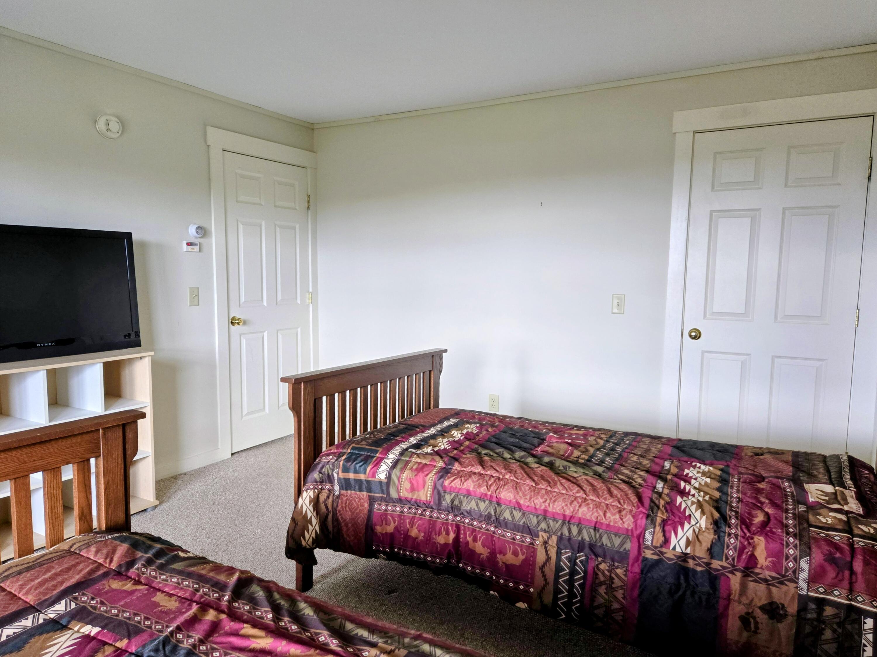 11 Whip Willow Farm Road, Unit 3 Rangeley, ME 04970 - Photo 37 of 60 Lower Level Bedroom