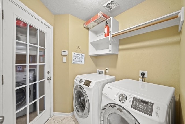 3103 Valley Court Manvel, TX 77578 - Photo 15 of 20 a utility room with dryer and washer