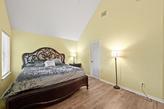 3103 Valley Court Manvel, TX 77578 - Photo 16 of 20 a bedroom with a bed and a dresser