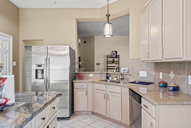 3103 Valley Court Manvel, TX 77578 - Photo 20 of 20 a kitchen with a sink stove and refrigerator