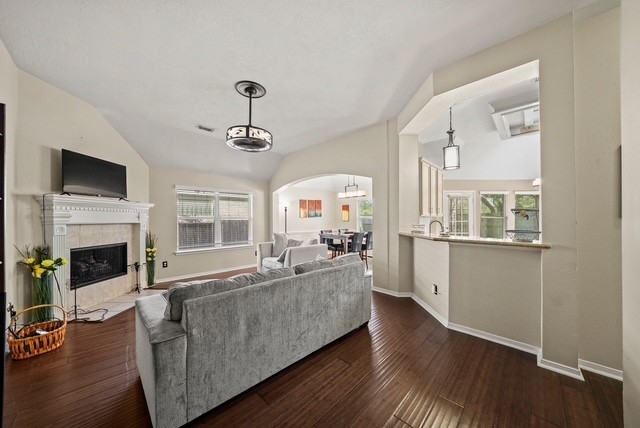 3103 Valley Court Manvel, TX 77578 - Photo 6 of 20 a living room with furniture fireplace and flat screen tv