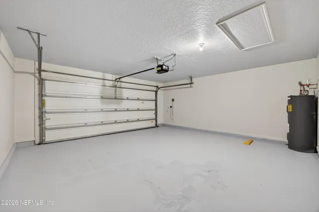 a view of a room with storage and utility room