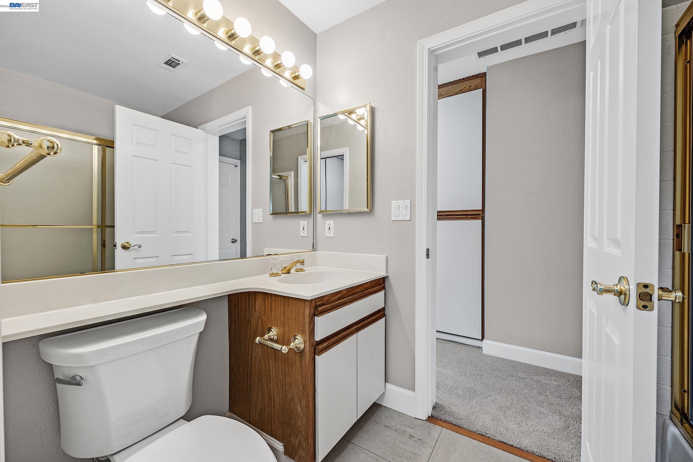 3769 Crow Canyon Road San Ramon, CA 94582 - Photo 41 of 56 a bathroom with a sink toilet and shower