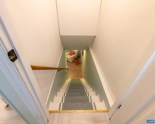 a bathroom with a granite countertop toilet sink and shower
