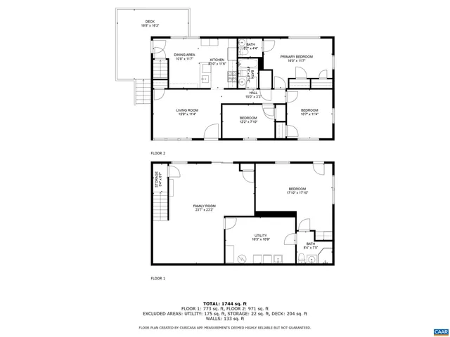 a living room with furniture and floor to ceiling windows