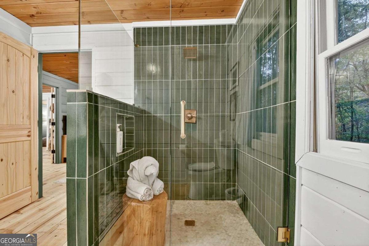 50 Lake View Drive, Unit 26 Blue Ridge, GA 30513 - Photo 18 of 33 a bathroom with a shower