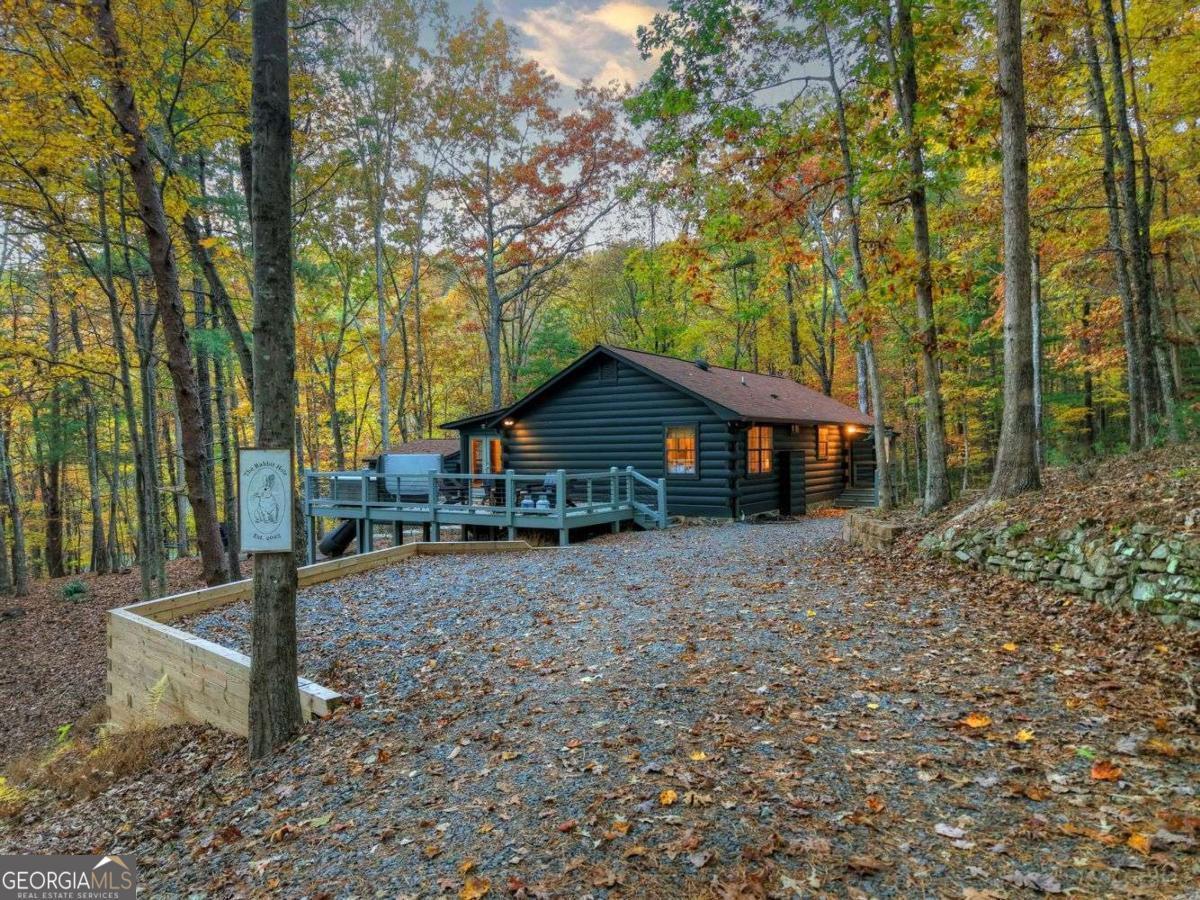50 Lake View Drive, Unit 26 Blue Ridge, GA 30513 - Photo 28 of 33 a house with trees in front of it