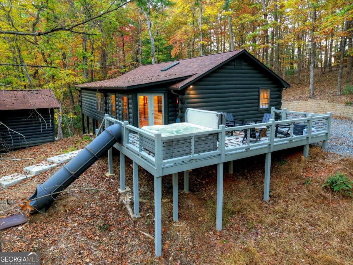 50 Lake View Drive, Unit 26 Blue Ridge, GA 30513 - Photo 30 of 33 a roof deck with table and chairs