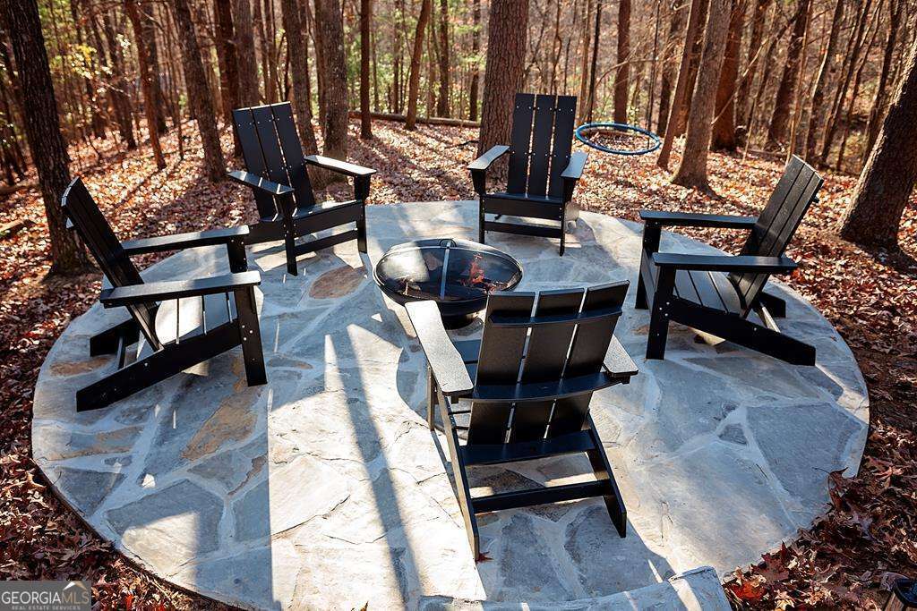 50 Lake View Drive, Unit 26 Blue Ridge, GA 30513 - Photo 4 of 33 a view of outdoor dining space with chairs