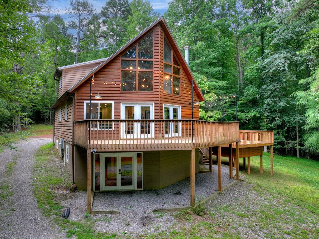 2 Watson Gap Road Mineral Bluff, GA 30559 - Photo 2 of 62 a view of a house with a yard and deck